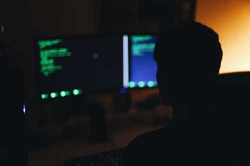 An unknown hacker is behind a major attack on America's internet infrastructure.